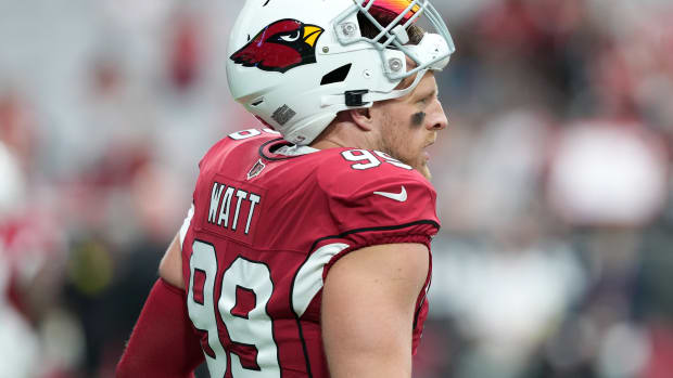Cardinals defensive end J.J. Watt warms up before a game.